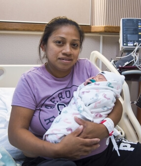 Mom Holding Newborn